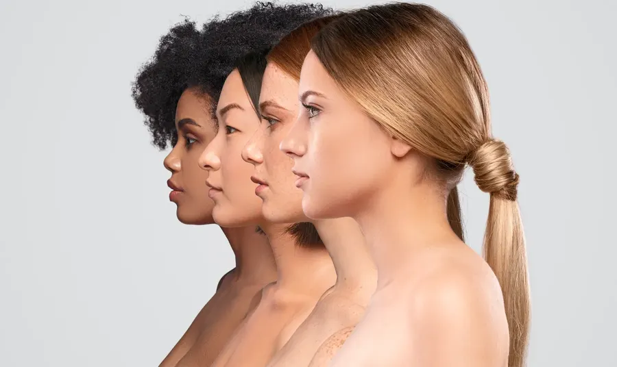 Four women in profile showing the jawline and neck